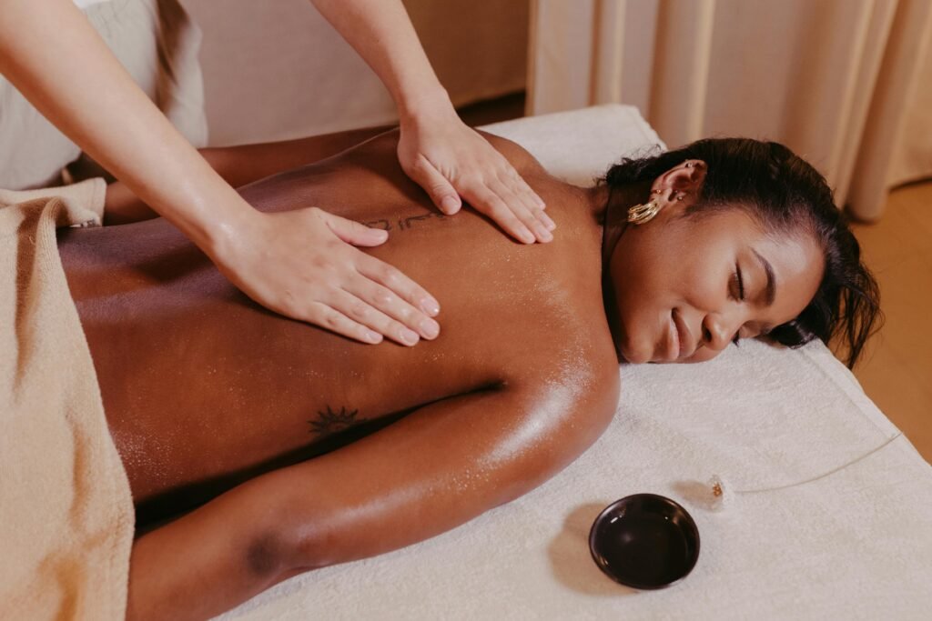 Woman enjoying a relaxing massage therapy session at the spa. Ideal for wellness or relaxation themes.